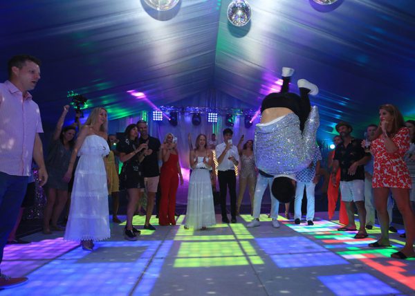 Break dancer on LED dance floor