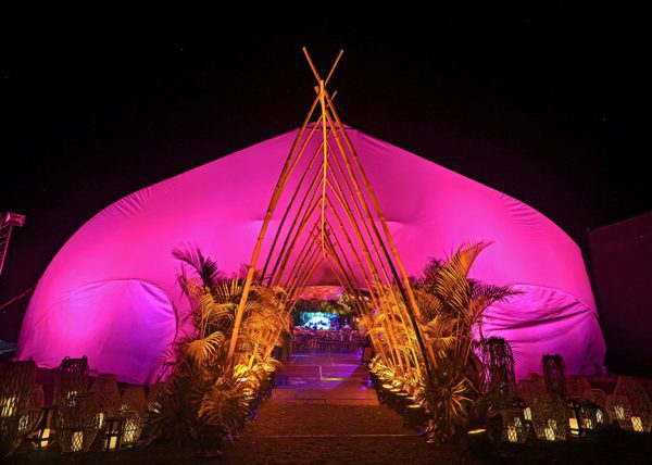 Luxury outdoor event tent with bamboo entrance at Marina Esplanade, Andaz Papagayo