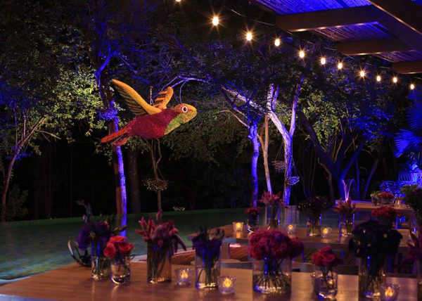 Table décor and hanging hummingbird floral sculpture.