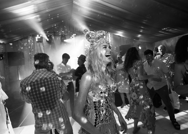 Dancer in disco ball outfit on sparkling event