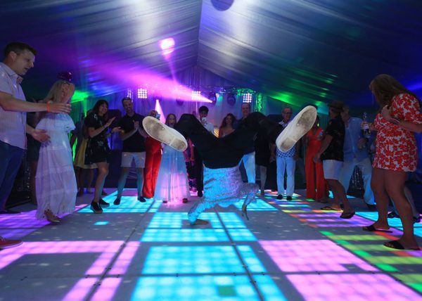 Break dancer on LED dance floor