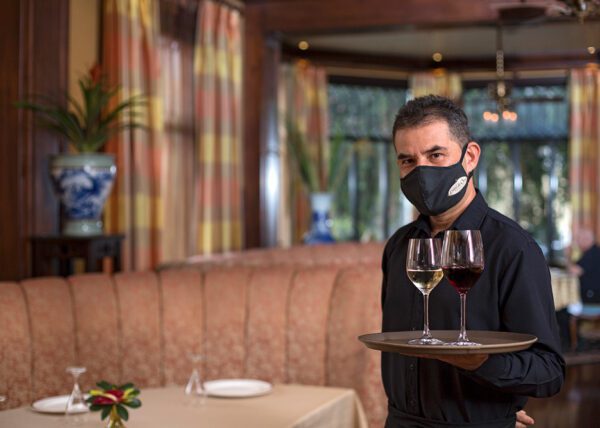 Waiter with face mask, COVID Protocol - Grano de Oro Hotel | Cayuga Collection