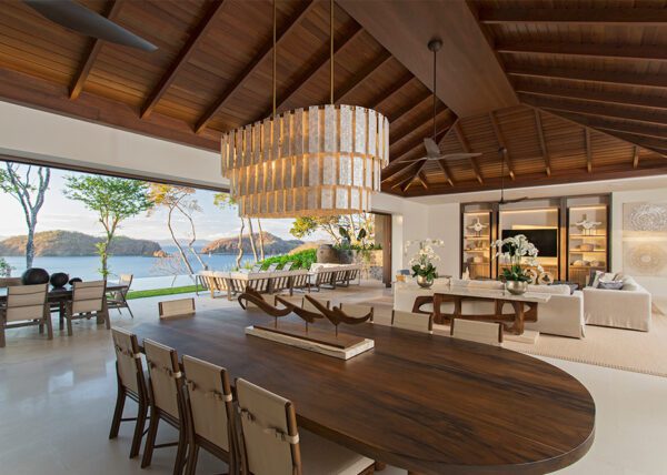 Marble finishes and a seashell inspired chandelier blends with the Golden hour scene. - 8 Monos | Peninsula Papagayo